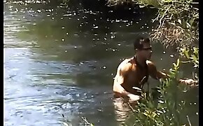 Curious aboriginal inhabitant of rainforest of Amazonian region found on the river bank gay magazine and imagined strange intercourse with pretty white boy with fair hair Felipe Vilhena