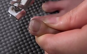 Woman cutting toenails