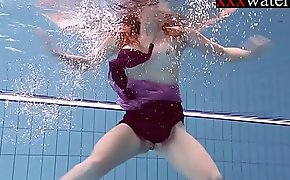 Smokin' sexy Russian redhead in the pool