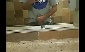 Jerking off in public bathroom