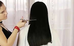 Girl has her hair cut as punishment for using her sister's hairbrush