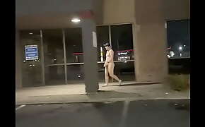 Naked walk in front of strip mall