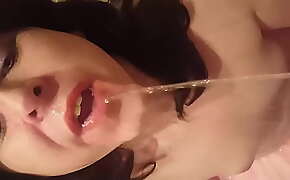 Sissy slut Luce gets piss and spunk on her face