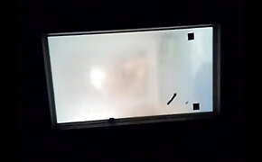 spy cloudy window after shower