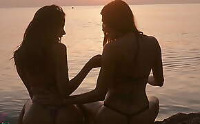 LESBIAN GIRLFRIENDS HAVING SEX AT SUNRISE ON A PARADISE BEACH