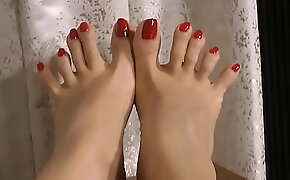 Red Polish On Hot Feet