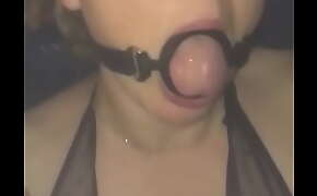 Brit girl Alison in mouth gag desperate to suck cock