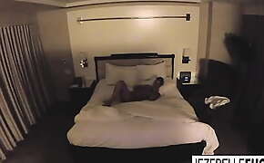Sexy Jezebelle Bond hangs out in her hotel room