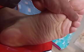 Brazilian male feet, moisturizing the feet.