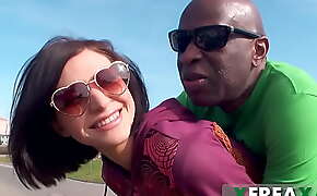Ukrainian hitch hiker Lina Arian gets picked up by a black guy in a car and then deep throats on his big black cock