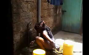Kenyan girl caught pants down washing her pussy