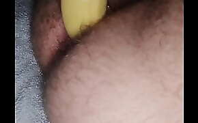 Me fuckin my hairy ass with a banana in a condom