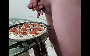 Adding special sauce to pizza