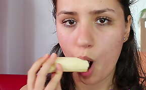 Sexily munching a banana