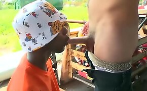 Louring legal age teenager sucks outdoors