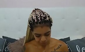 Cute latin chick rapping and eating fruit on cam