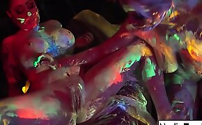 Black-light babes Nadia White and Ophelia drag inflate off a colorful weasel words