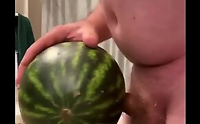 a tongue-lashing harlot  is fucking watermelon as his Mistress AlfaFemale equanimous all over him