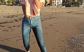 Wet shoot on a public beach with Crazy Model  Risky outdoor masturbation  Foot fetish  Pee in jeans 